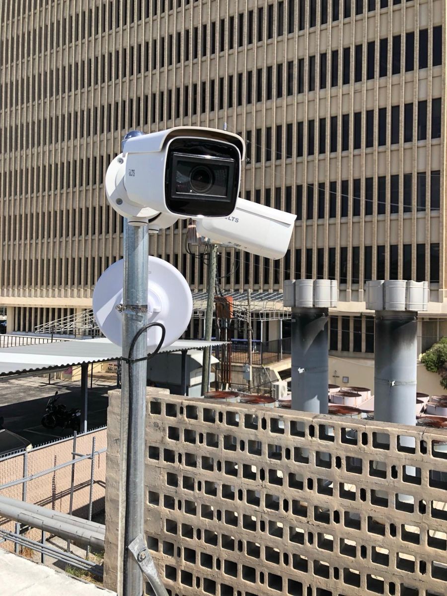 Rooftop security camera overlooking the street