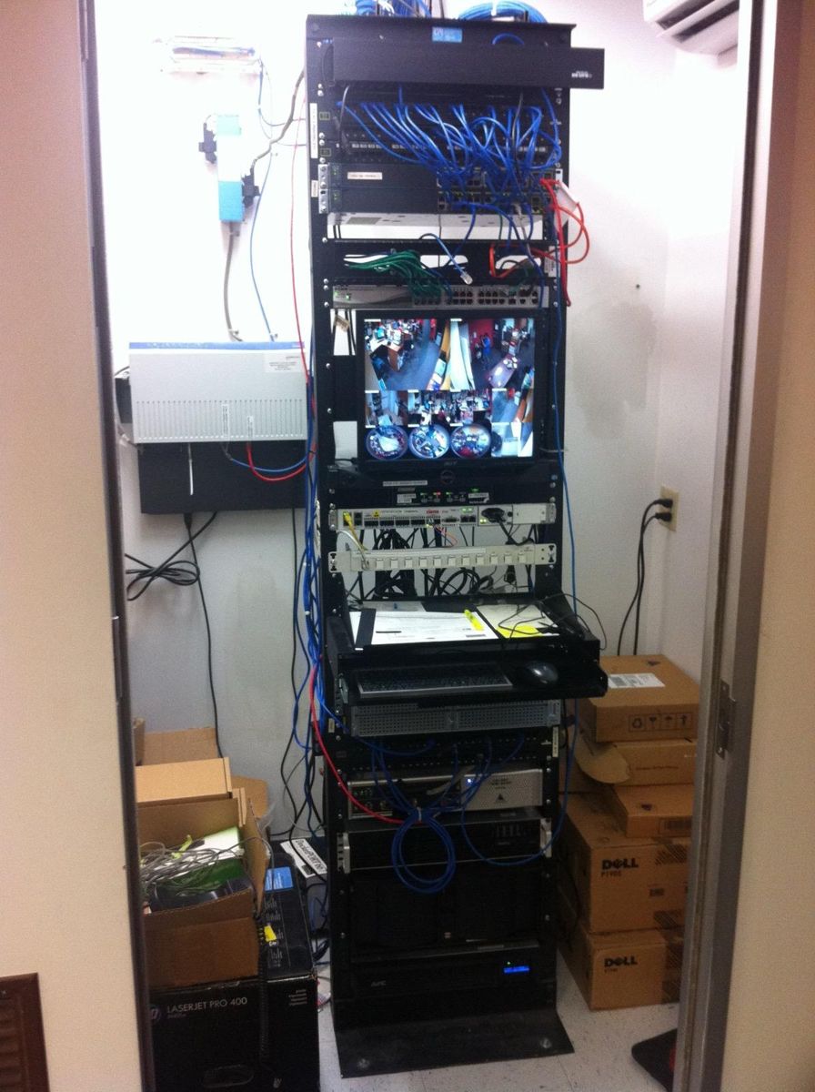 Server closet with floor-standing rack